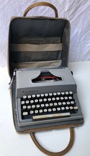 Remington Macchina da scrivere vintage grigia con custodia