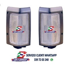 COPPIA DX+SX FANALI ANTERIORI CORNICE NERA PER NISSAN KING CAB DAL 1986 AL 1992