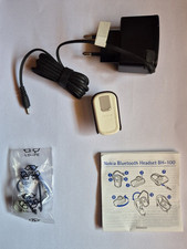 Nokia Bluetooth BH-100 mai usato + Caricabatterie 