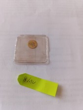 riproduzione di monete miniatura in oro