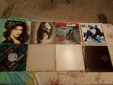 14 dischi in vinile 33/45 giri