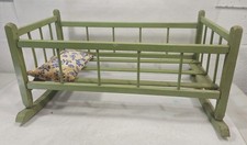 Bambola a dondolo vintage in