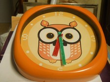 orologio da parete con il gufo