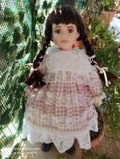 Bambola in porcellana da