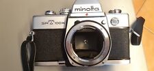 Macchina fotografica analogica Minolta SRT 100X con 3 obiettivi