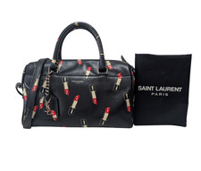 Borsa a tracolla Saint Laurent modello rossetto bambino borsone pelle nera