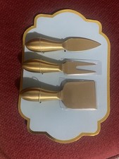 Coltelli da formaggio oro