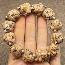 Antico legno pesca intaglio oggetti antichi bracciale legno testa di tigre