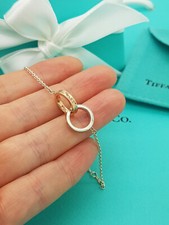 Bracciale regolabile Tiffany & Co. 1837 cerchio ad incastro argento e rubedo 7,25"