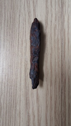 Medieval iron bolt head
