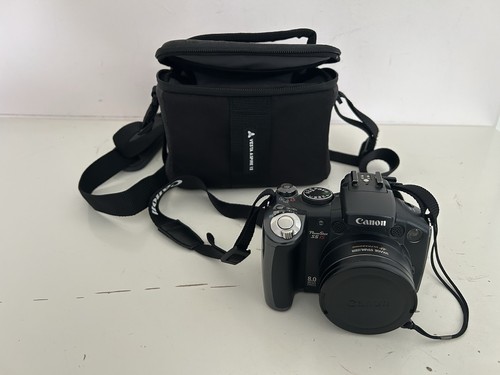 Canon powershot is - s5,