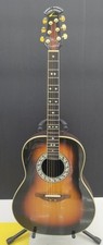 Chitarra elettrica acustica