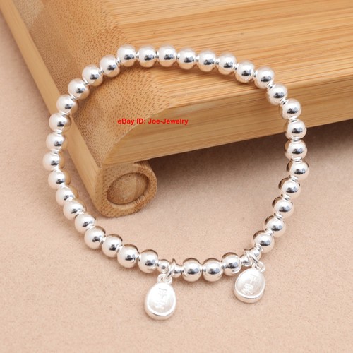 Bracciale elastico perle lisce