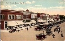 Main Street Concordia Kansas Early Cars Downtown Scene E.C. Cartolina d'epoca Kropp