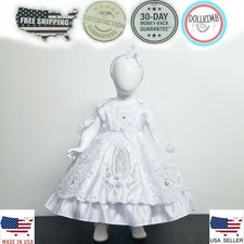 Vestido bordado con la Vergine