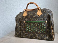 Louis Vuitton verde traforato
