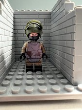 United Bricks Lego Minifigure Unità di Servizio Germania Est X