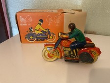 Motorcycle with spring tin