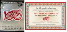 2025 - 2026 DETROIT RED WINGS "AWAY" MAGLIA PATCH 100° ANNIVERSARIO STILE PUCK