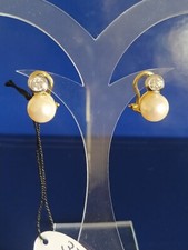 Orecchini con diamanti e perle