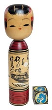 Bambola Kokeshi creativa con