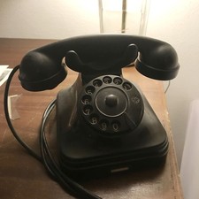 Telefono d'epoca e da collezione in bachelite con disco