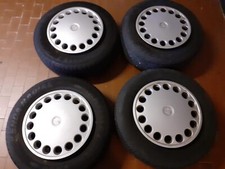 set gomme cerchi e copri cerchi alfa romeo alfa 75 usate 2 gomme nuove 