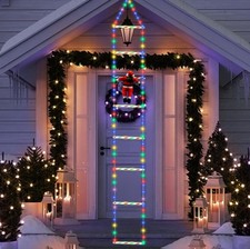 Babbo Natale su scala luminosa