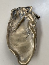 Donna In Ottone Svuota Tasche