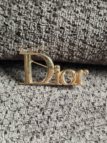 Broche vestiaire dior doré - vestiaire,