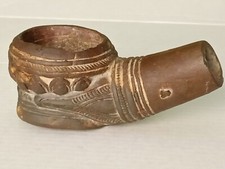 Antica pipa in terracotta