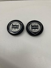 2 Tappi Copri mozzo Lancia Ypsilon Delta Musa Nuovo Fondo Di Magazzino Descrizio