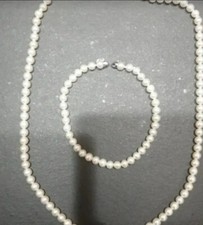 girocollo e bracciale perle e oro bianco 750 Miluna 