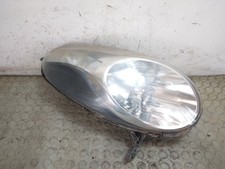 21973 Faro fanale proiettore ant dx Nissan Micra K12 dal 2002 al 2010 cod 26010b