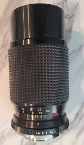 Mitakon zoom f - 1:4.5, =