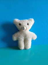 "COCCOLINO" peluche vintage, colore bianco panna, 1983, altezza 11 cm.