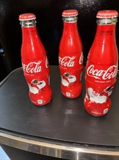 Bottiglia avvolta Coca-Cola