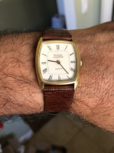 Bulova accutron gold - accutron,