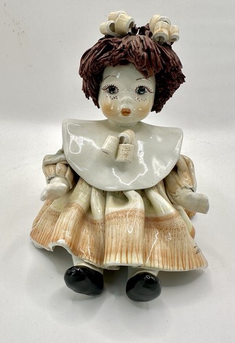 Statuina bambola ceramica