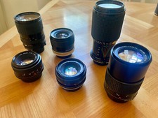 Set 6 obiettivi + corpo macchina Minolta XD7 + Filtri + Accessori + Borsa