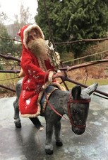 vecchio babbo natale su asino