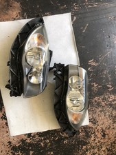 FARI ANTERIORI FANALI PER BMW E87 SERIE 1 Con Supporti