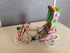 a three wheel colourful tricycle bike 