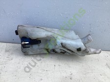 Bottiglia e motore lavatrice