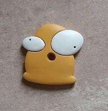 Gommino coprichiavi, cover. Personaggio stralunato