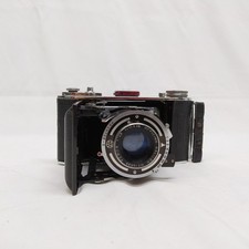 Macchina fotografica - , a