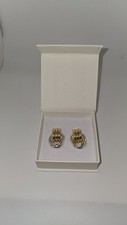 Orecchini mini nodo metallo