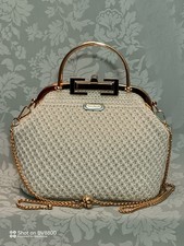 Borse donna lavorate a