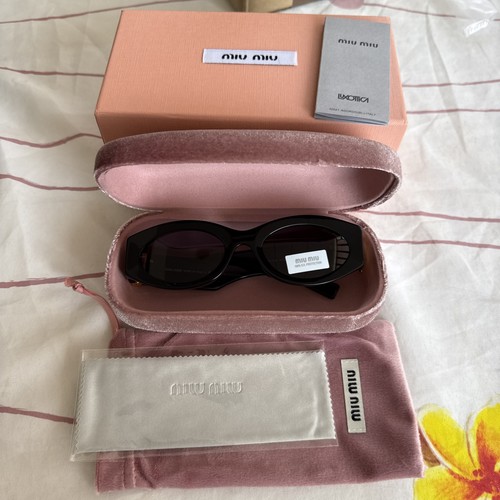 Miu sunglasses black - miu, gold