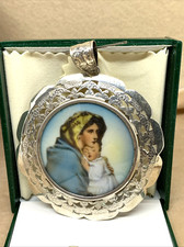 ANTICO MEDAGLIONE CAPOCULLA IN LAMINA ARGENTATA, TRAFORATO PRIMI 900